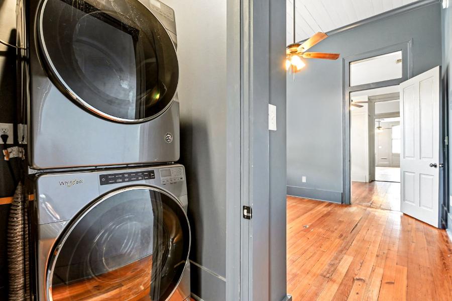 Stacked washer and dryer inside the apartment