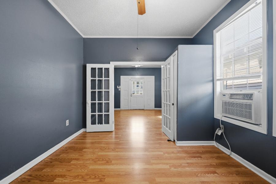 Living room with French doors opening to the front room