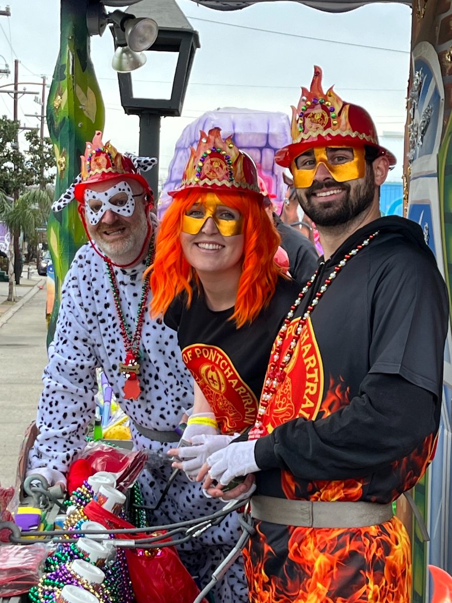 Cameron Smith riding in a Krewe of Pontchartrain parade float in New Orleans