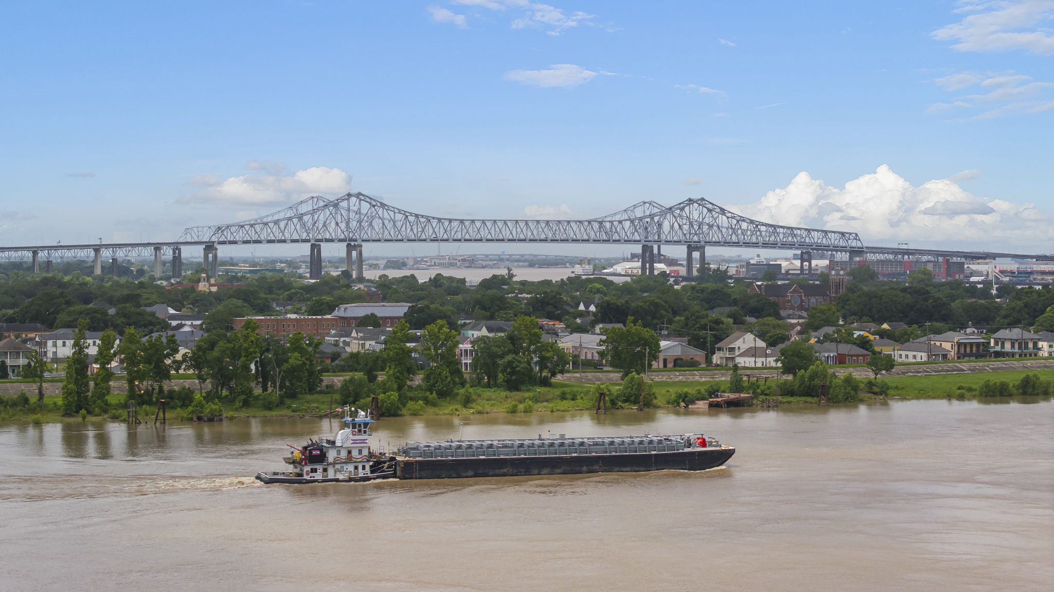 New Orleans skyline along the Mississippi River at dusk